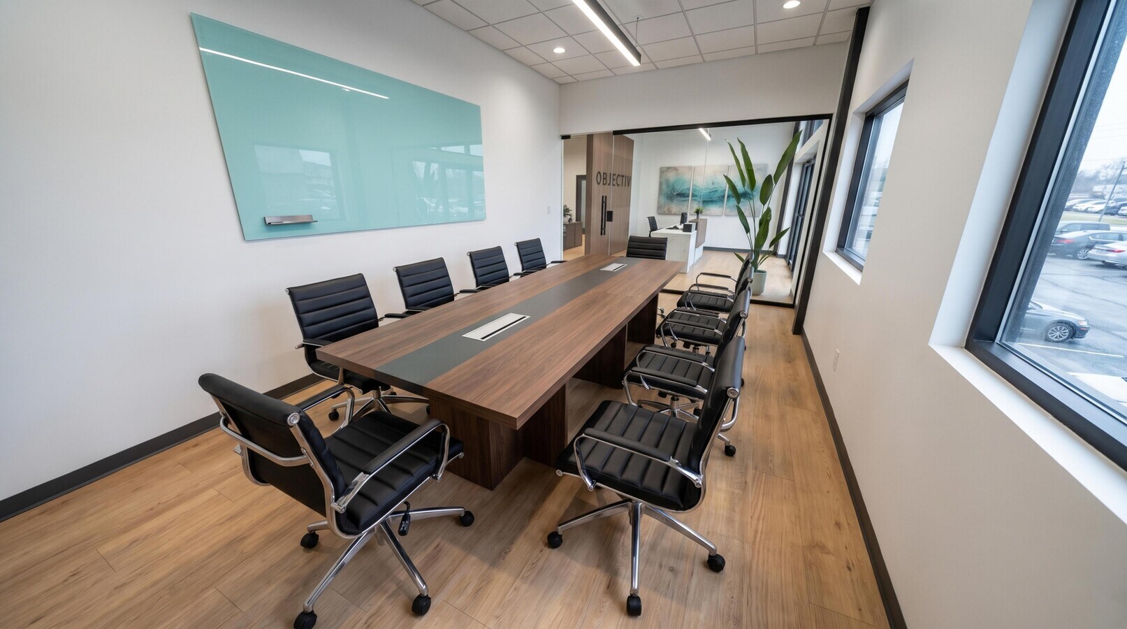 Rendering of the boardroom with a long walnut table and glass writing wall.