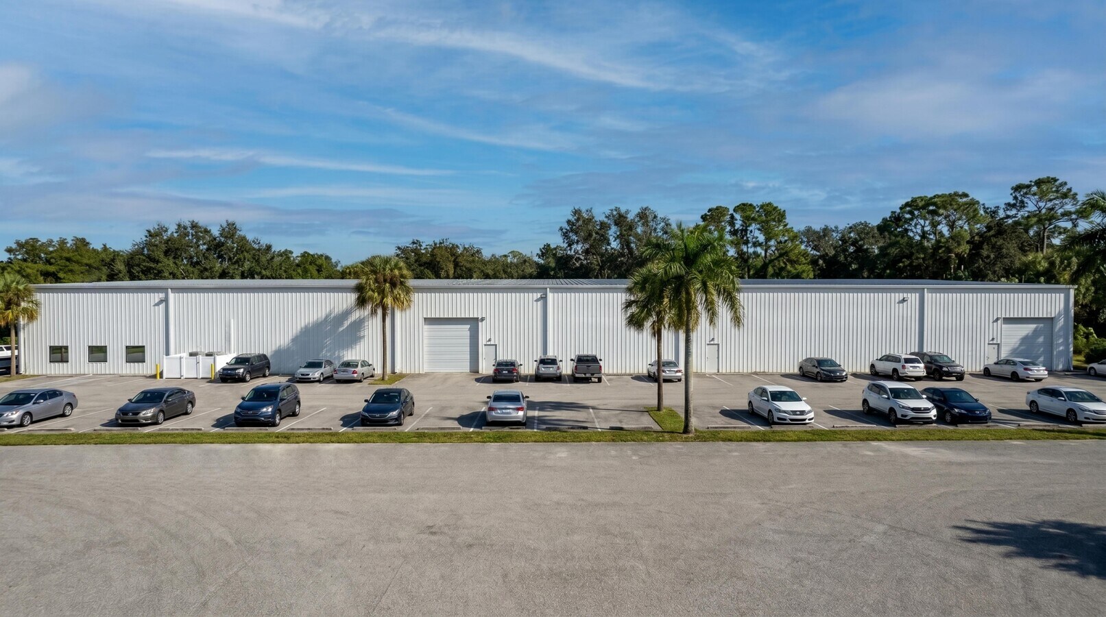 Side elevation along the parking field — 198 Lock Road, Deerfield Beach, FL