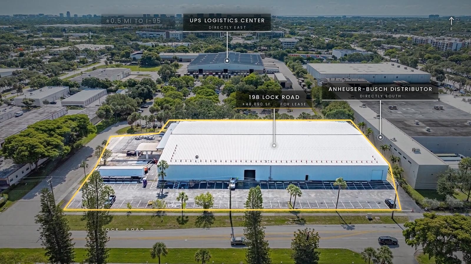 Aerial of 198 Lock Road outlined in yellow, with a UPS logistics center labeled directly east and an Anheuser-Busch distributor labeled directly south.